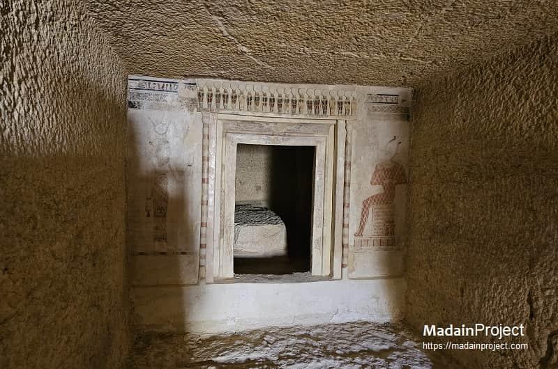 Painted hieroglyphic doorway inside an ancient Egyptian rock-cut tomb at Siwa Oasis