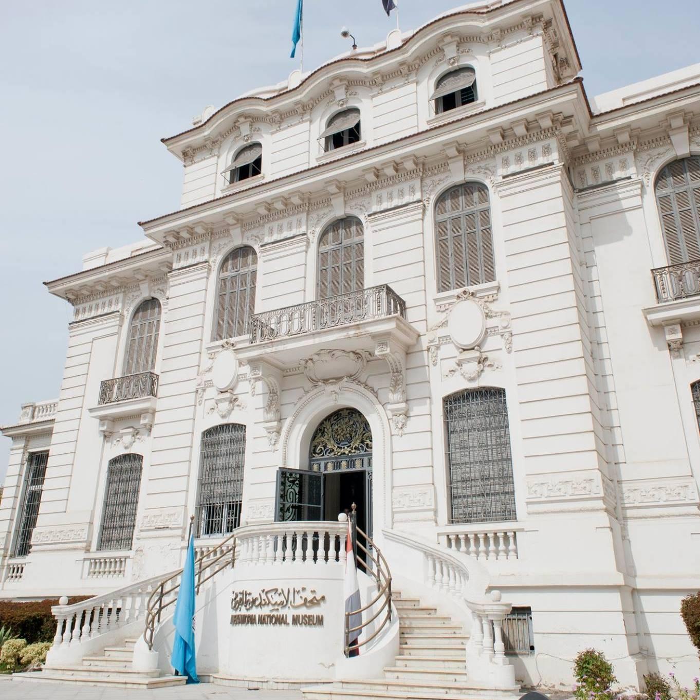 White palatial facade and entrance staircase of the Alexandria National Museum