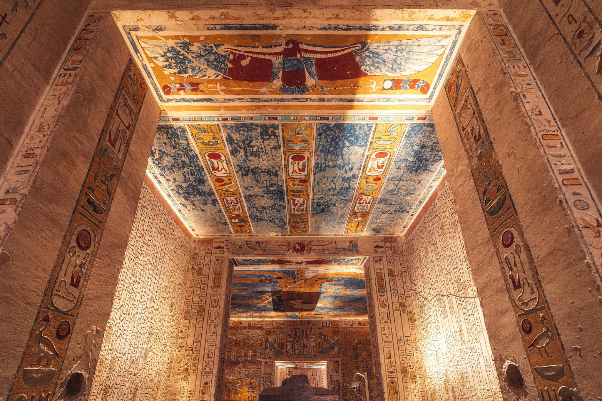 Antechamber with painted ceiling and hieroglyph walls inside the tomb of Ramesses.