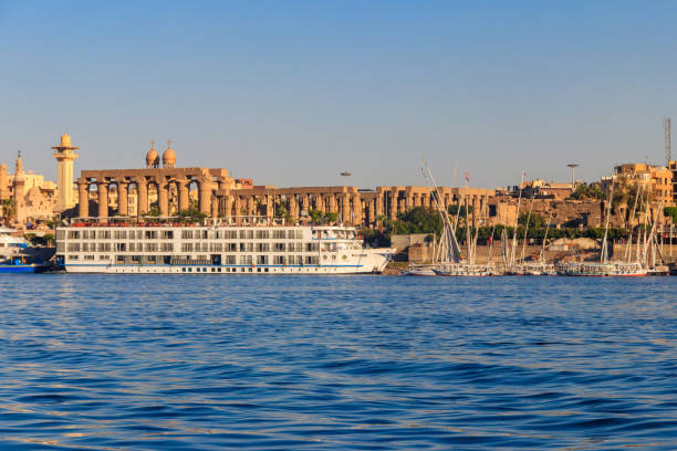Luxor Temple is a large Ancient Egyptian temple complex on east bank of Nile river in Luxor (ancient Thebes). View from Nile river