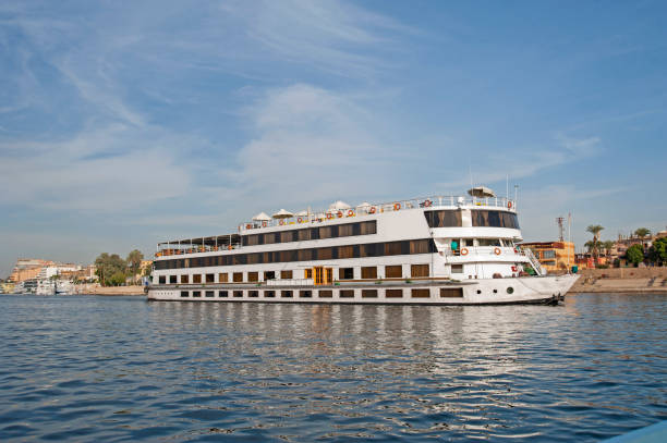 Large luxury traditional Egyptian river cruise boat sailing on the Nile