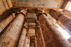Intricate ceiling art with four-faced Hathor Head pillars in the hypostyle hall in the Temple of Hathor at Dendera completed in the Ptolemaic era around 50 BC between Luxor and Abydos towns,Egypt